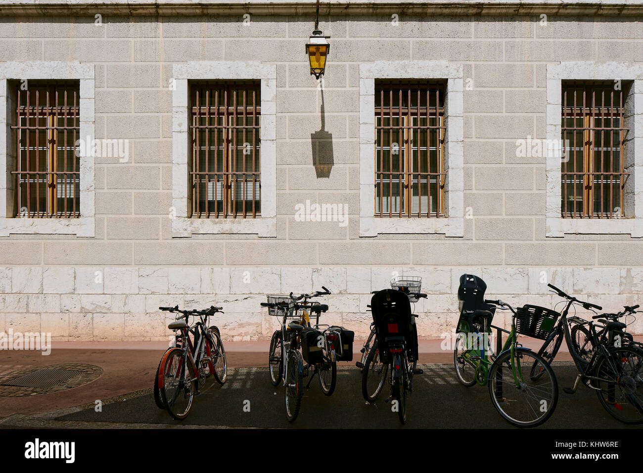 Row of bicycles parked outside building, Annecy, Auvergne-Rhone-Alpes, France Stock Photo