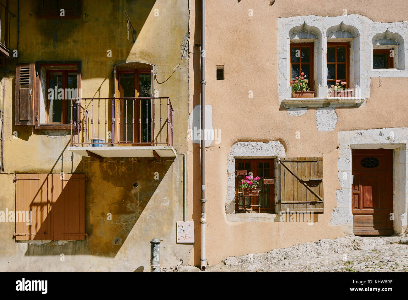 Traditional house exteriors on cobbled street, Annecy, Auvergne-Rhone-Alpes, France Stock Photo
