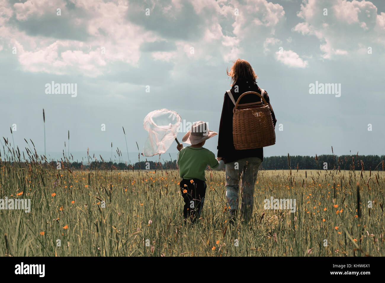 Mother and child with butterfly net, Ural, Sverdlovsk, Russia Stock Photo