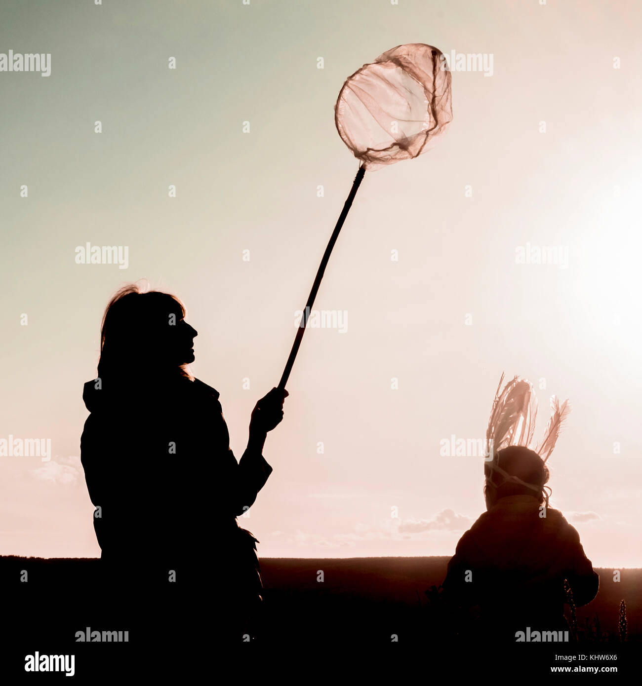 Mother and child with butterfly net, Ural, Sverdlovsk, Russia Stock Photo