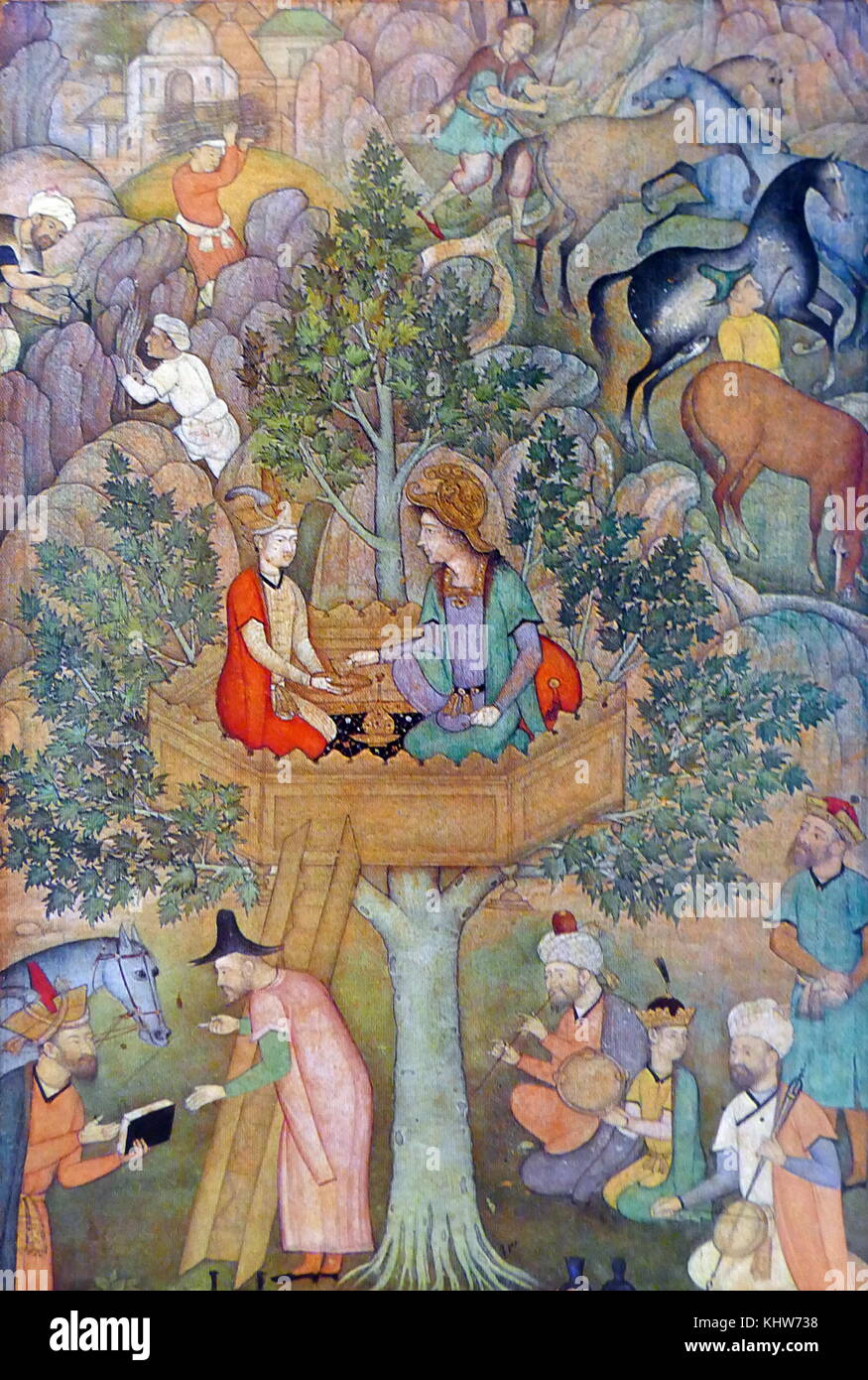 Painting depicting Alexander the Great seated in a tree-platform taking a golden cup from a scholar kneeling beside him; he wears an Italian renaissance helmet embossed with a galloping horse and reclines against a bolster dressed in a pale green coat over a blue robe. Painted by an unknown Mughal artist. Dated 17th Century Stock Photo