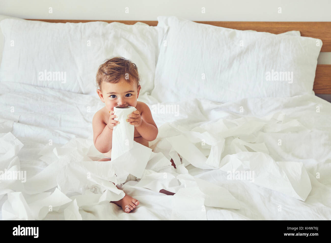 Young girl sitting on toilet hires stock photography and images Alamy