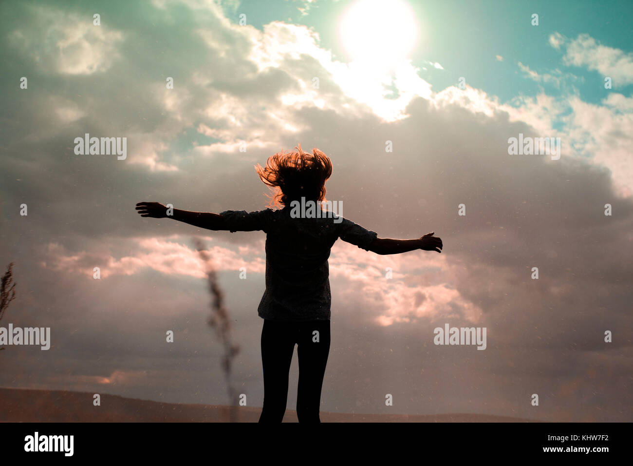 Silhouette woman open arms hi-res stock photography and images - Alamy