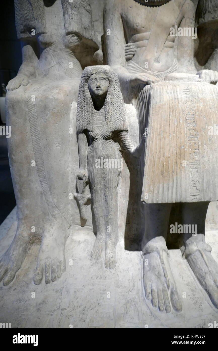 Statue of a family group of Ptah-mai, chief of the Wab-priests of Ptah, carved from limestone, from the 19th Dynasty. Dated 13th Century BC Stock Photo