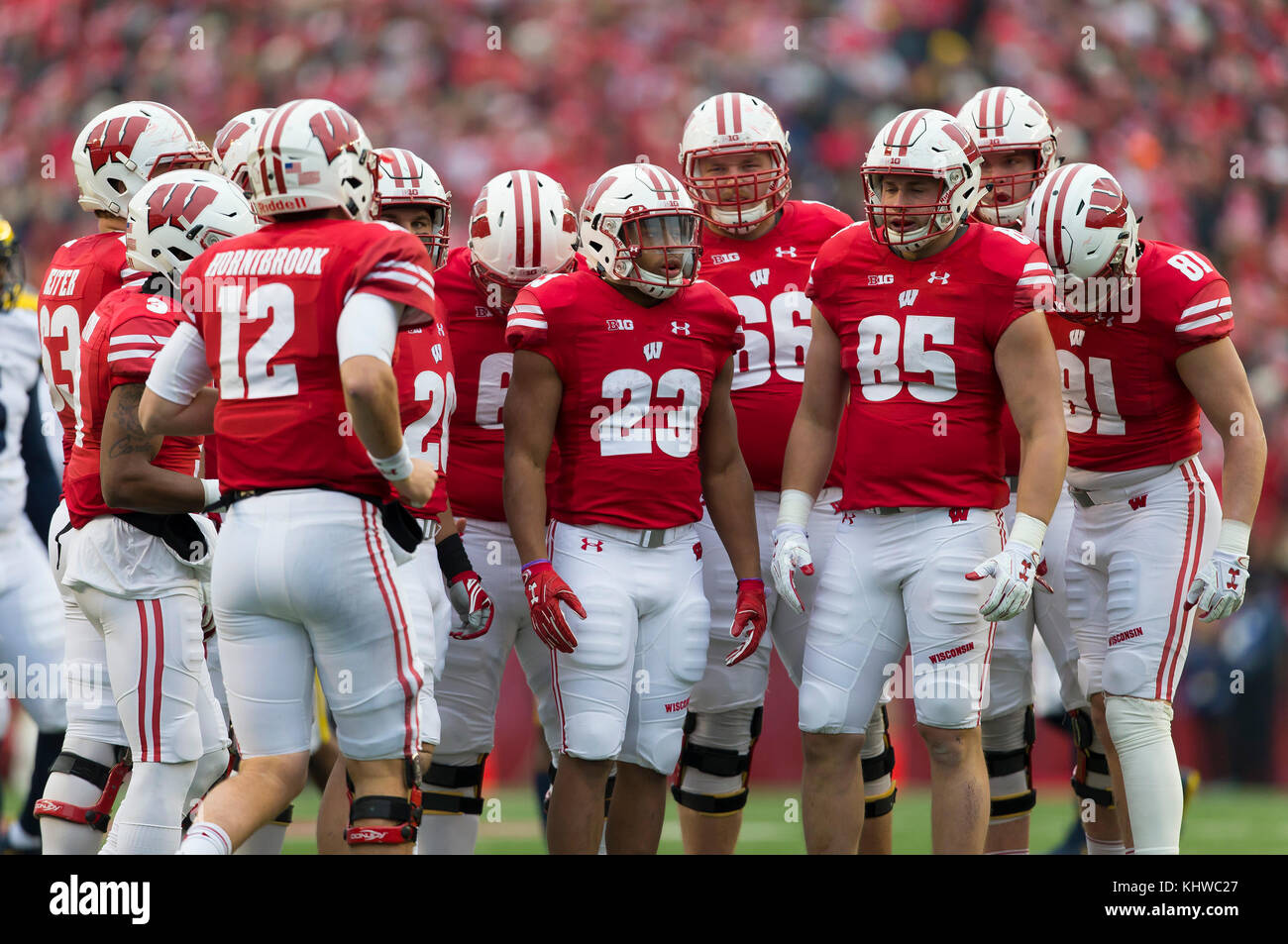 Madison, WI, USA. 18th Nov, 2017. Badger offense huddles up during the NCAA Football game between the Michigan Wolverines and the Wisconsin Badgers at Camp Randall Stadium in Madison, WI. Wisconsin defeated Michigan 24-10. John Fisher/CSM/Alamy Live News Stock Photo