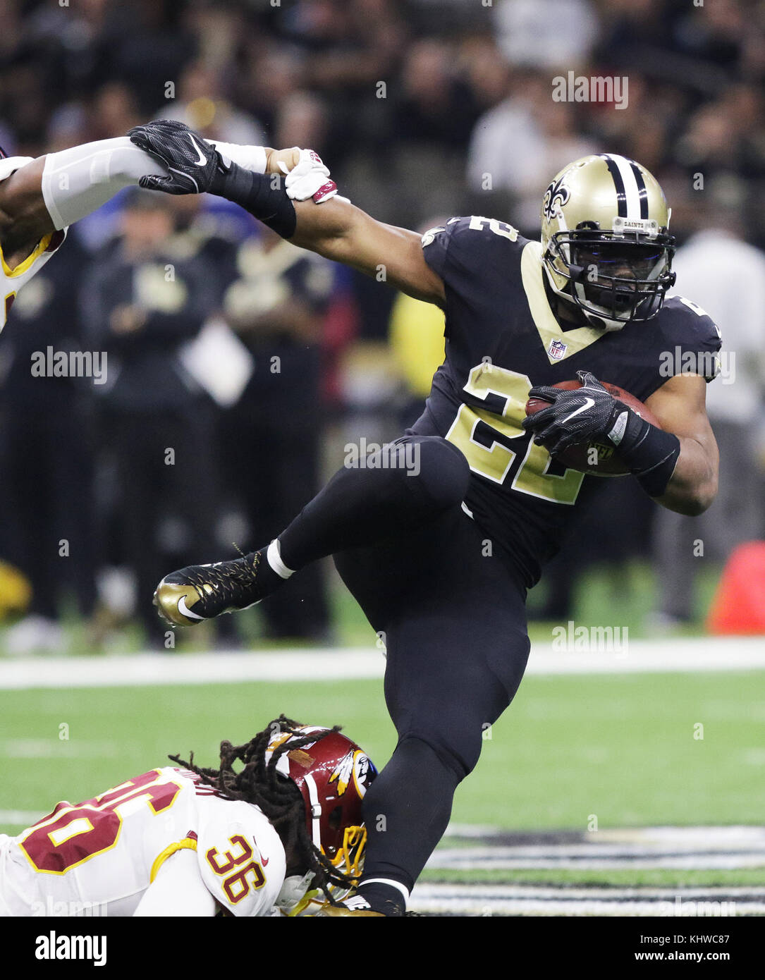 New Orleans, LOUISIANA, USA. 19th Nov, 2017. (top to bottom) New Orleans Saints running back Mark Ingram steps over Washington Redskins free safety D.J. Swearinger at the Mercedes-Benz Superdome in New Orleans, Louisiana USA on November 19, 2017. Credit: Dan Anderson/ZUMA Wire/Alamy Live News Stock Photo