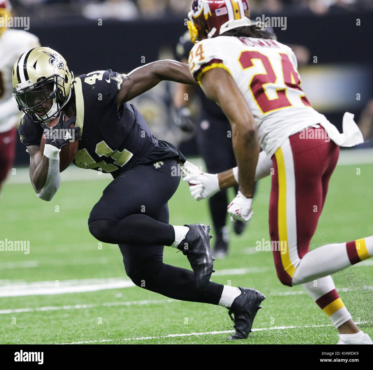 New Orleans, LOUISIANA, USA. 19th Nov, 2017. New Orleans Saints running back Alvin Kamara tries to get past Washington Redskins cornerback Josh Norman at the Mercedes-Benz Superdome in New Orleans, Louisiana USA on November 19, 2017. The Saints beat the Redskin 34-31 in overtime. Credit: Dan Anderson/ZUMA Wire/Alamy Live News Stock Photo