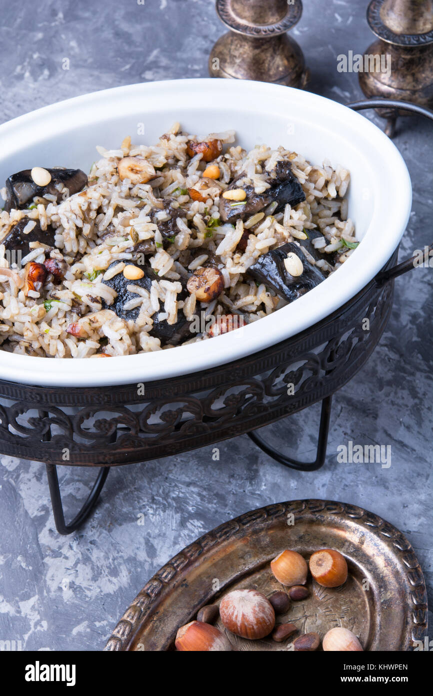 Vintage Risotto Rice traditional risotto from rice and mushrooms in an oval dish Stock Photo ...