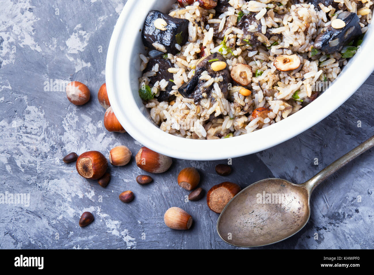 Vintage Risotto Rice traditional risotto from rice and mushrooms in an oval dish Stock Photo ...