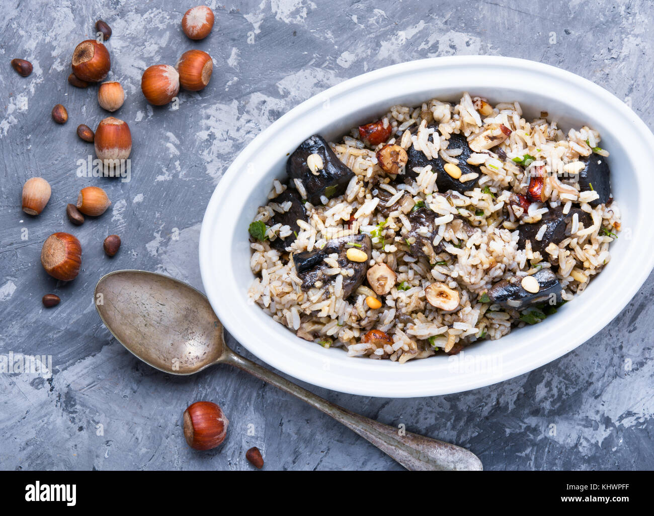 Vintage Risotto Rice traditional risotto from rice and mushrooms in an oval dish Stock Photo ...