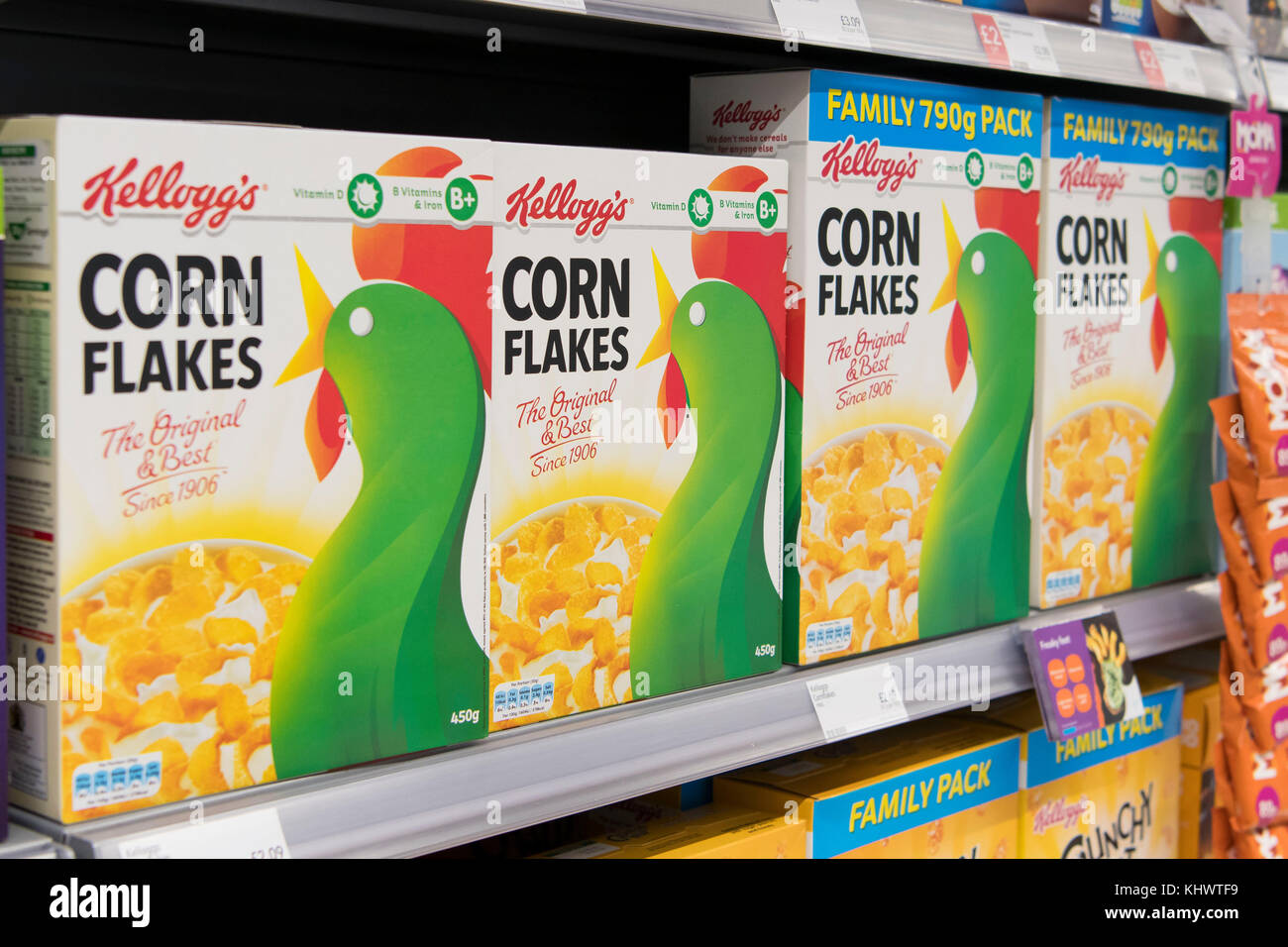 Boxes of Kellogs cornflakes breakfast cereal on sale on a shelf in a supermarket store. Stock Photo