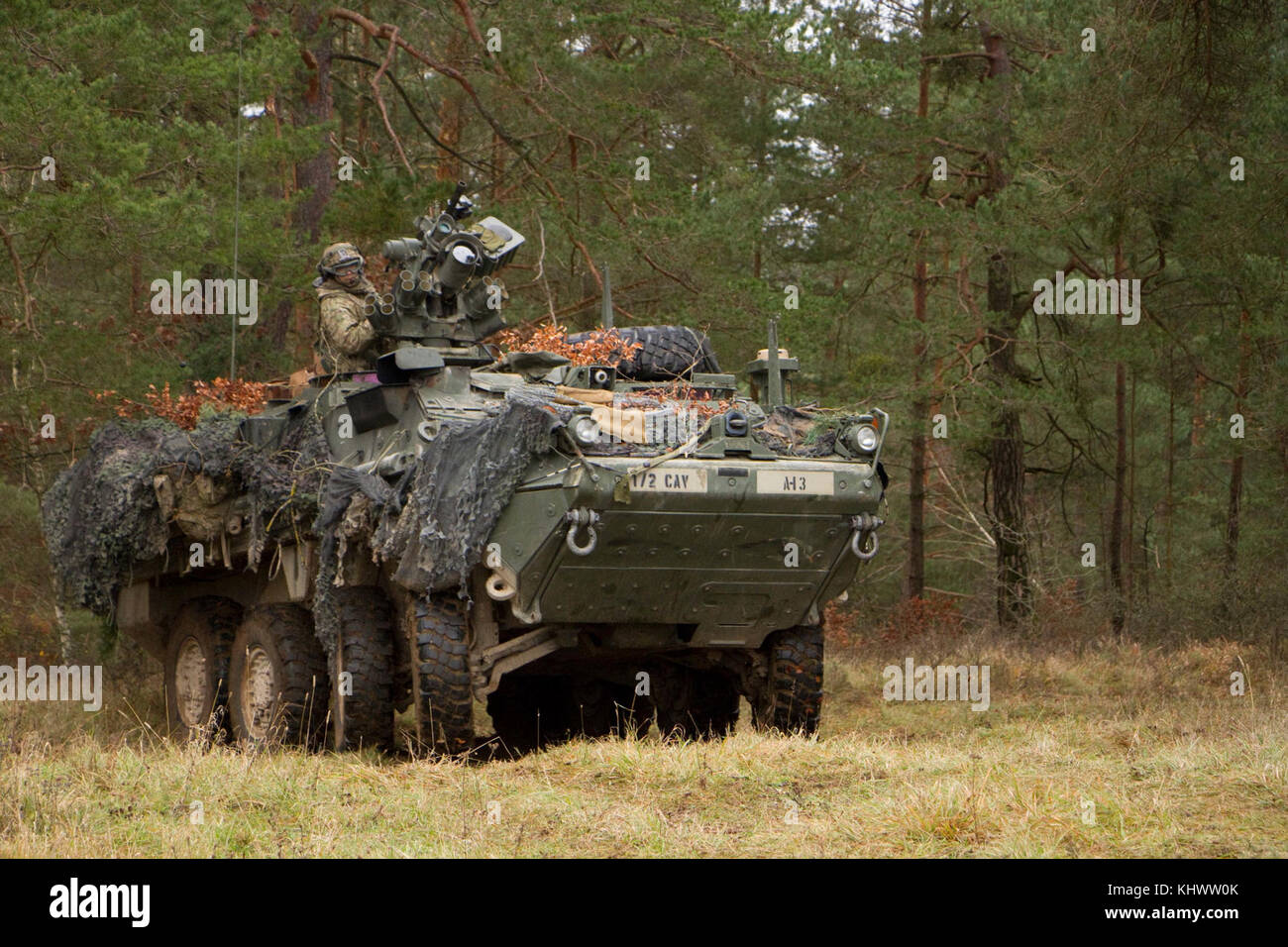 Soldiers from 1st Squadron, 2d Cavalry Regiment in their Stryker Combat Vehicle are training in a battle against opposing forces during Allied Spirit VII at the 7th Army Training Command's Hohenfels Training Area, Germany, Oct. 30 to Nov. 22, 2017. Allied Spirit is a U.S. Army Europe-directed, 7ATC-conducted multinational exercise series designated to develop and enhance NATO nations interoperability and readiness. Stock Photo