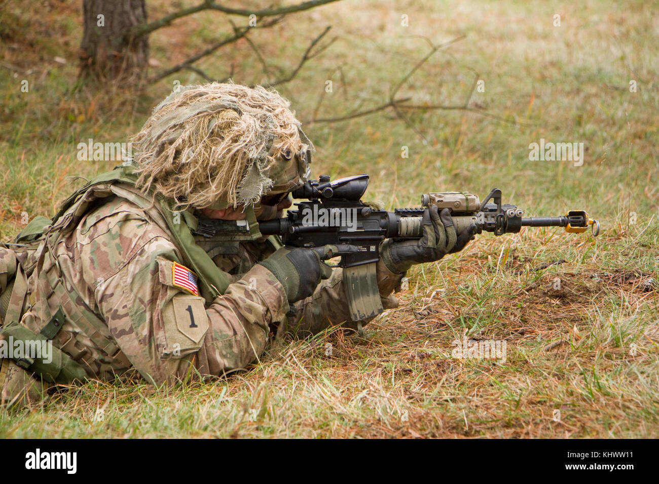 Staff Sgt. Marcin Szewczyk from 1st Squadron, 2d Cavalry Regiment in a fighting position while taking part in a battle against opposing forces during Allied Spirit VII at the 7th Army Training Command's Hohenfels Training Area, Germany, Oct. 30 to Nov. 22, 2017. Allied Spirit is a U.S. Army Europe-directed, 7ATC-conducted multinational exercise series designated to develop and enhance NATO nations interoperability and readiness. Stock Photo