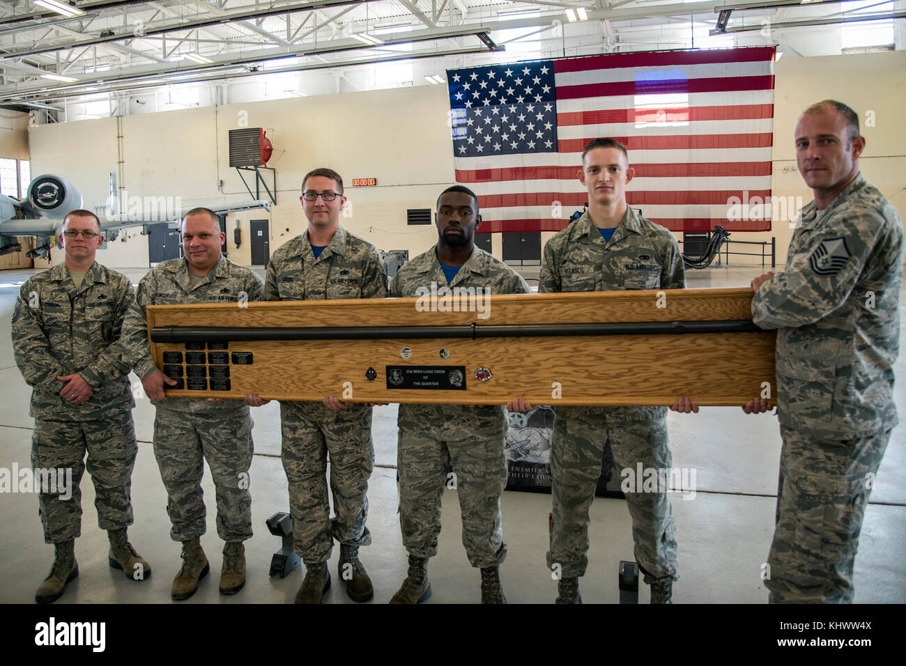 Members of the 74th Aircraft Maintenance Unit came out victorious as the winners for a quarterly weapons load competition, Nov. 16, 2017, at Moody Air Force Base, Ga. Judges evaluated the competitors based on dress and appearance, a knowledge exam and loading various munitions to determine the swiftest and most efficient load crew. (U.S. Air Force photo by Airman Eugene Oliver) Stock Photo