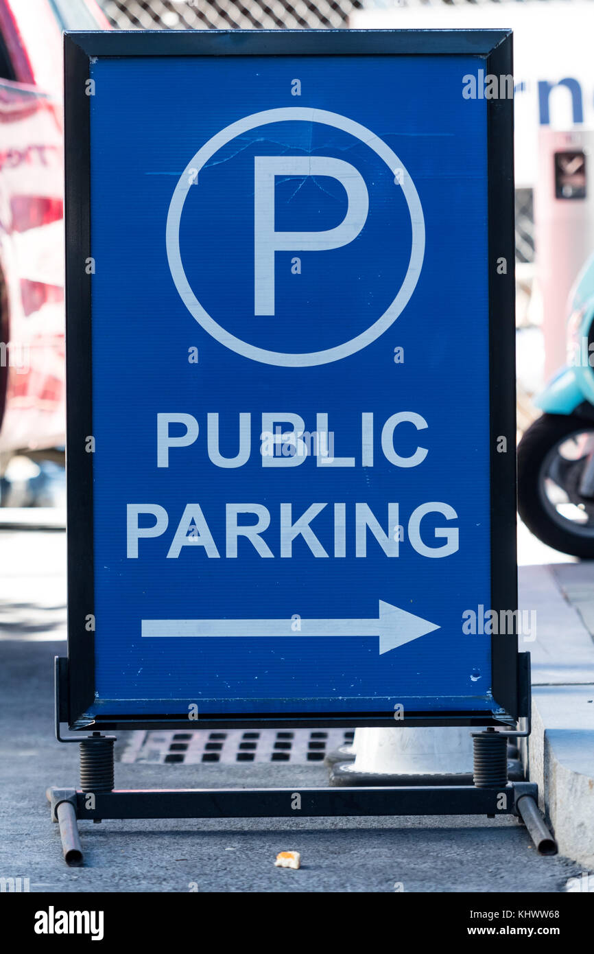 Public Parking Arrow Sign on city street Stock Photo