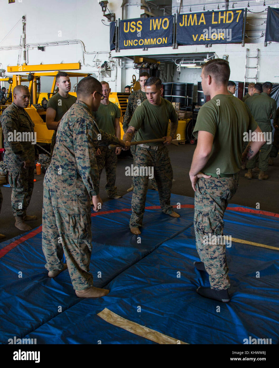ATLANTIC OCEAN (Nov. 16, 2017) Marines assigned to Battalion Landing Team 26E Company practice basic self-defense in the hangar bay of the amphibious assault ship USS Iwo Jima (LHD 7). Iwo Jima, components of the Iwo Jima Amphibious Ready Group and the 26th Marine Expeditionary Unit are conducting a Combined Composite Training Unit Exercise that is the culmination of training for the Navy-Marine Corps team and will certify them for deployment. (U.S. Navy photo by Mass Communication Specialist 3rd Class Kevin Leitner/Released) Stock Photo