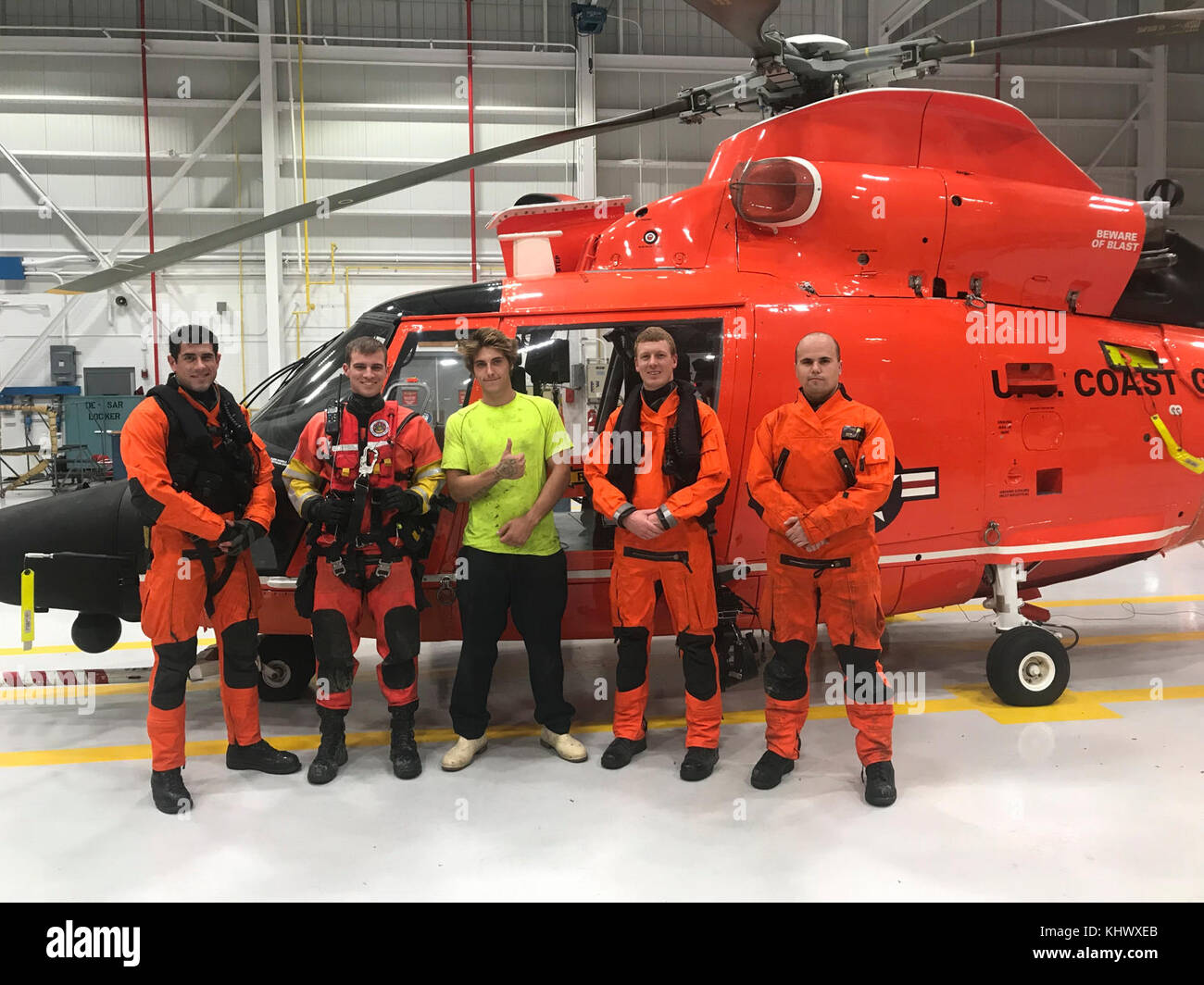 The Coast Guard rescued a man after his vessel grounded in Bastin Bay, Louisiana, November 18, 2017. A Coast Guard Air Station MH-65 Dolphin helicopter aircrew hoisted the man from his vessel and transported him back to base. (U.S. Coast Guard photo) Stock Photo