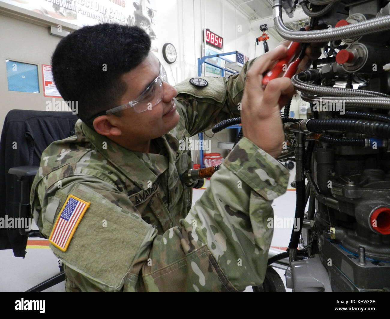 Private 1st Class Randall Amayadiaz, with the Utah National Guard, puts