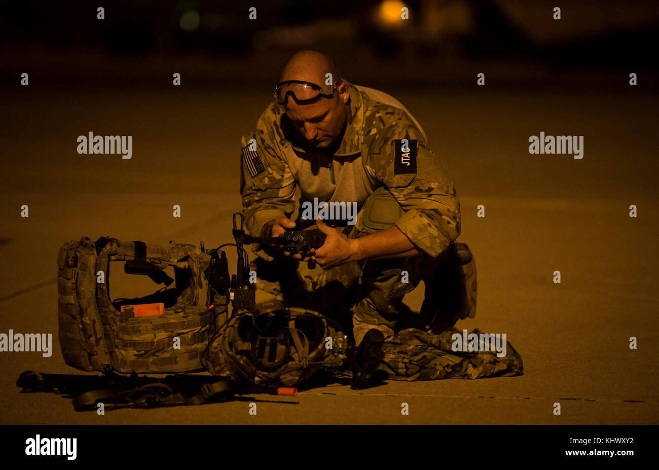 A pararescueman from 48th Rescue Squadron prepares his gear before ...