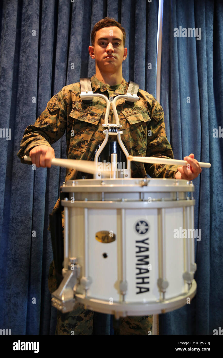 MARINE CORPS BASE QUANTICO, Virginia - Cpl. Michael Olle, a native of Schulenburg, Texas, poses for a photo after band rehearsal with the Quantico Marine Corps Band, Nov. 16. Olle, a graduate of Schulenburg High School, is a percussionist with the band. 'I am thankful for my family, because I know they'll always be there for me when I need them,' said Olle. (U.S. Marine Corps Photo by Sgt. Shaehmus Sawyer) Stock Photo