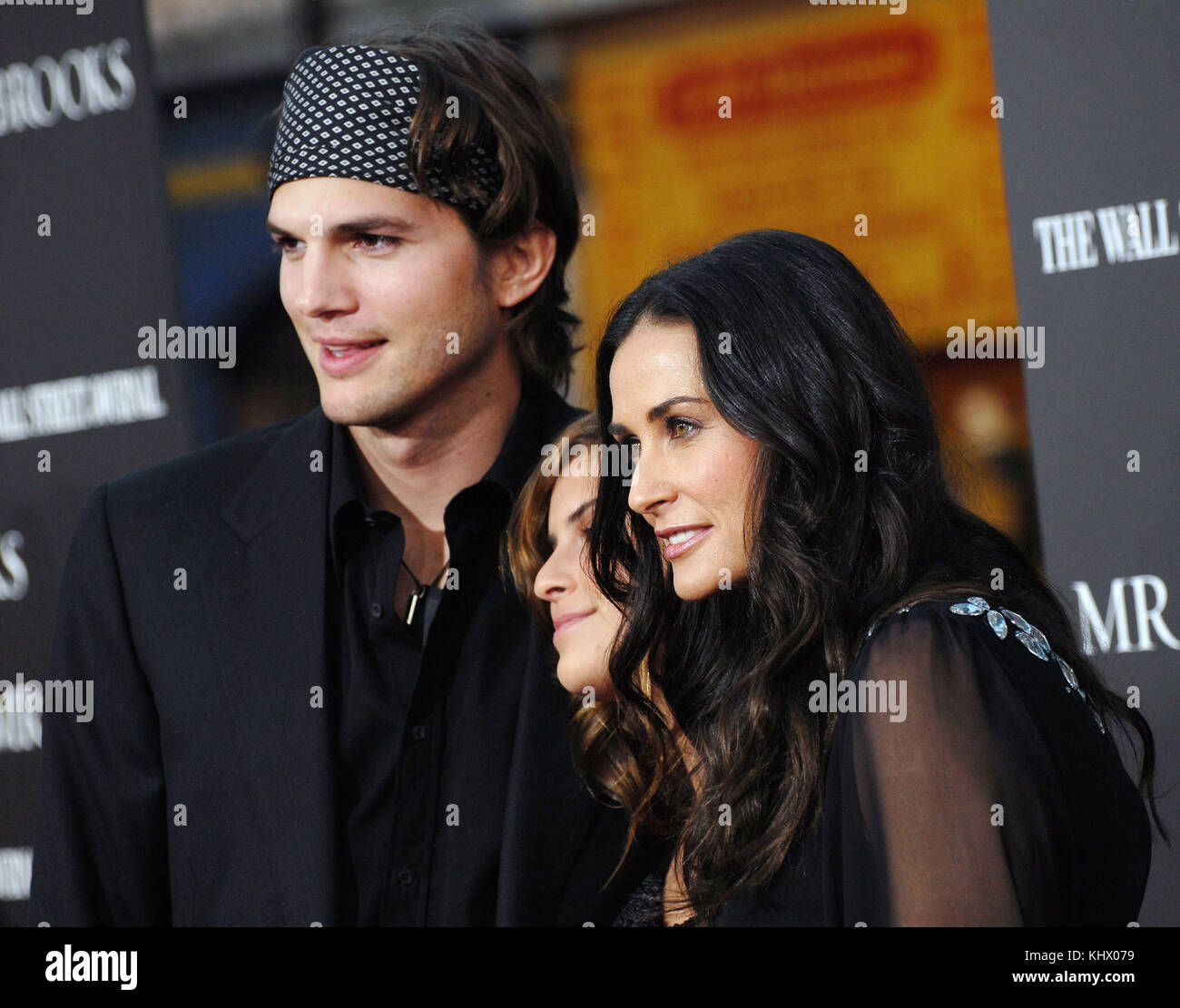 Ashton Kutcher with Demi Moore and Tallulah Belle Willis arriving at Mr