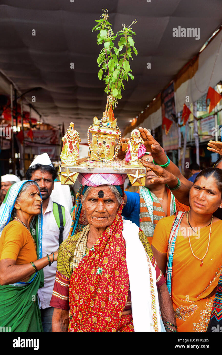Wari Procession. Woman with tulsi plant on head. Pune, Maharashtra. Stock Photo