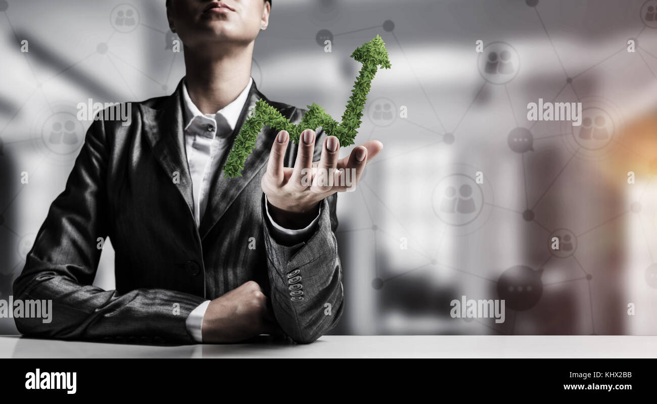Businessman presenting growing graph Stock Photo - Alamy
