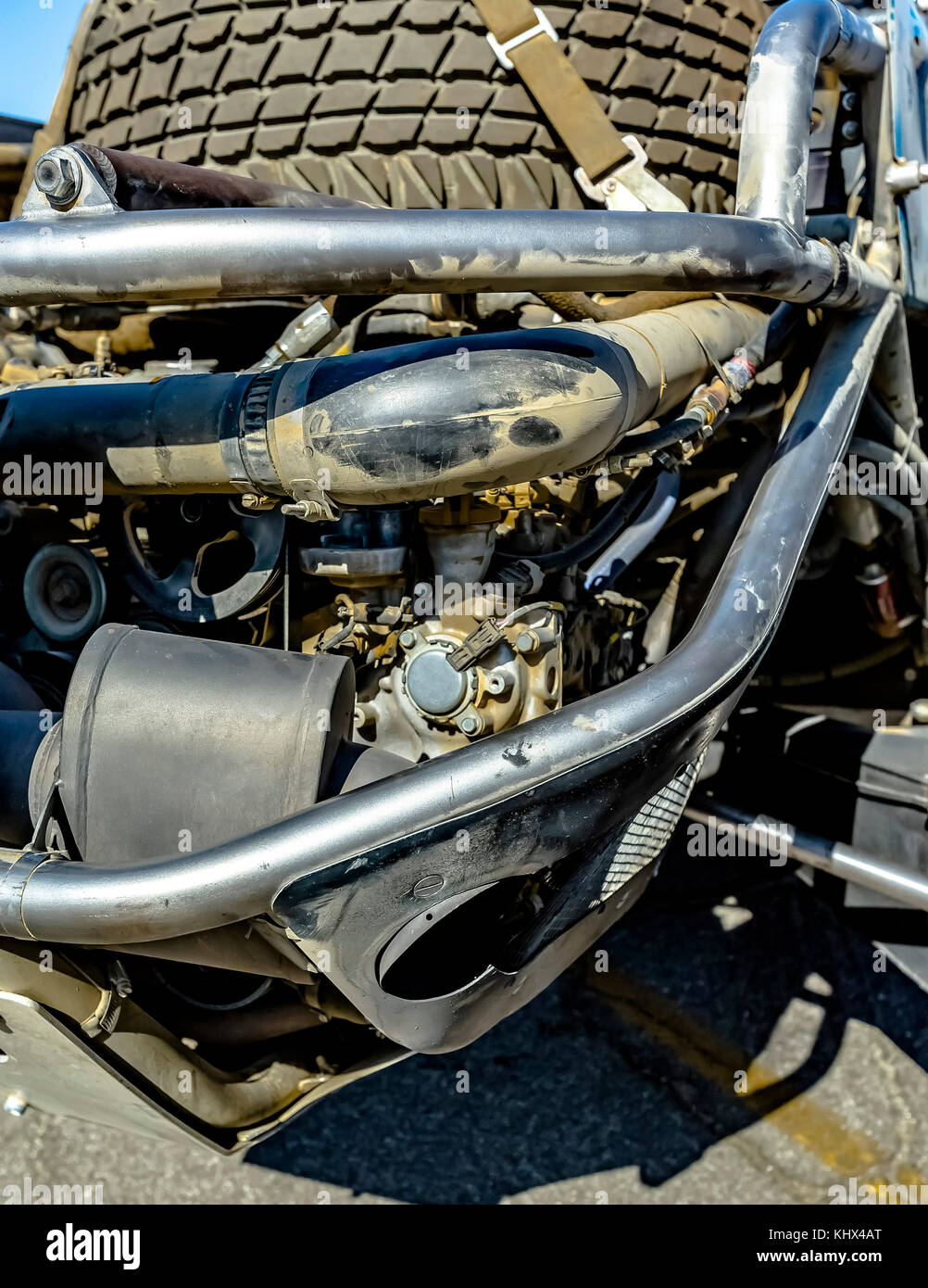 Car Engine in the back with the spare tire. Engine and other mechanical