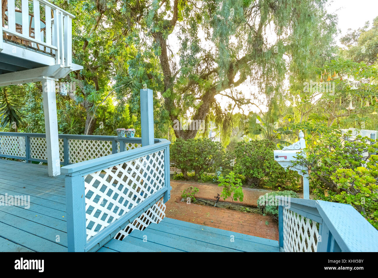 Short Stairs Leading Out The Entry Way Of A Cottage Style Home