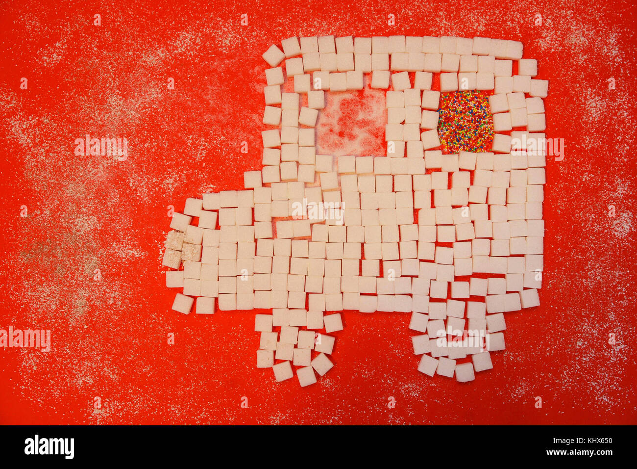 Symbolic picture for Diabetes disease, made of sugar cubes. Diabetes mellitus is characterized by recurrent or persistent high blood sugar. Stock Photo