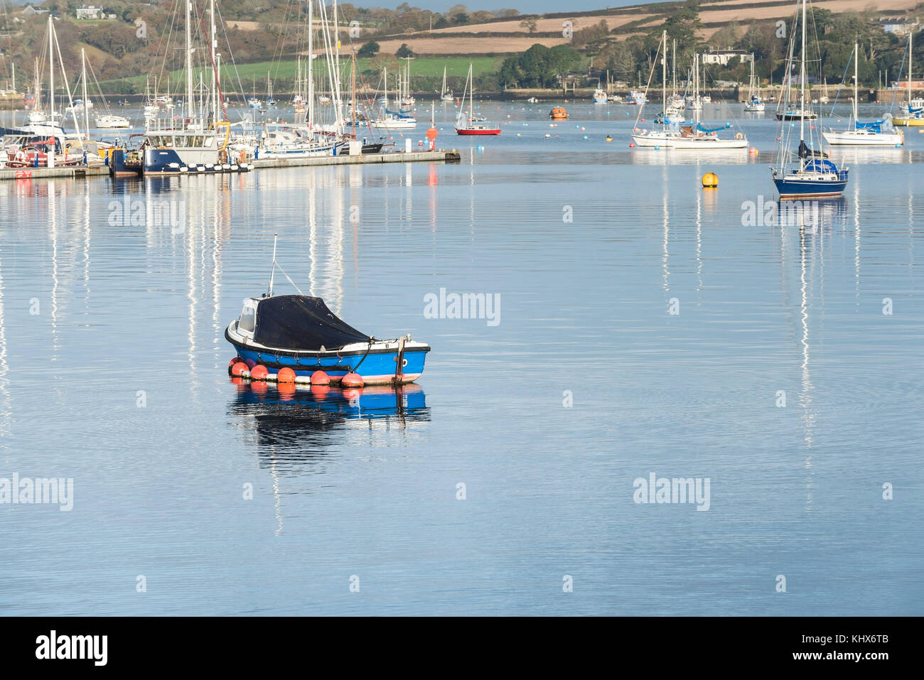 A small motor boat moored in Falmouth Harbour Cornwall UK. Stock Photo