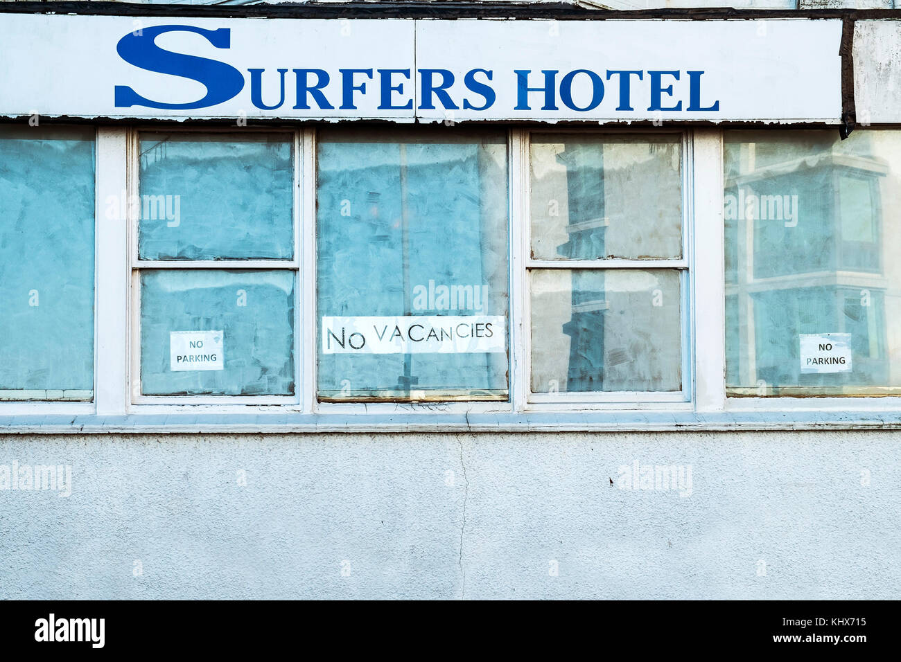 Windows in a surfers hotel in Newquay Cornwall UK. Stock Photo
