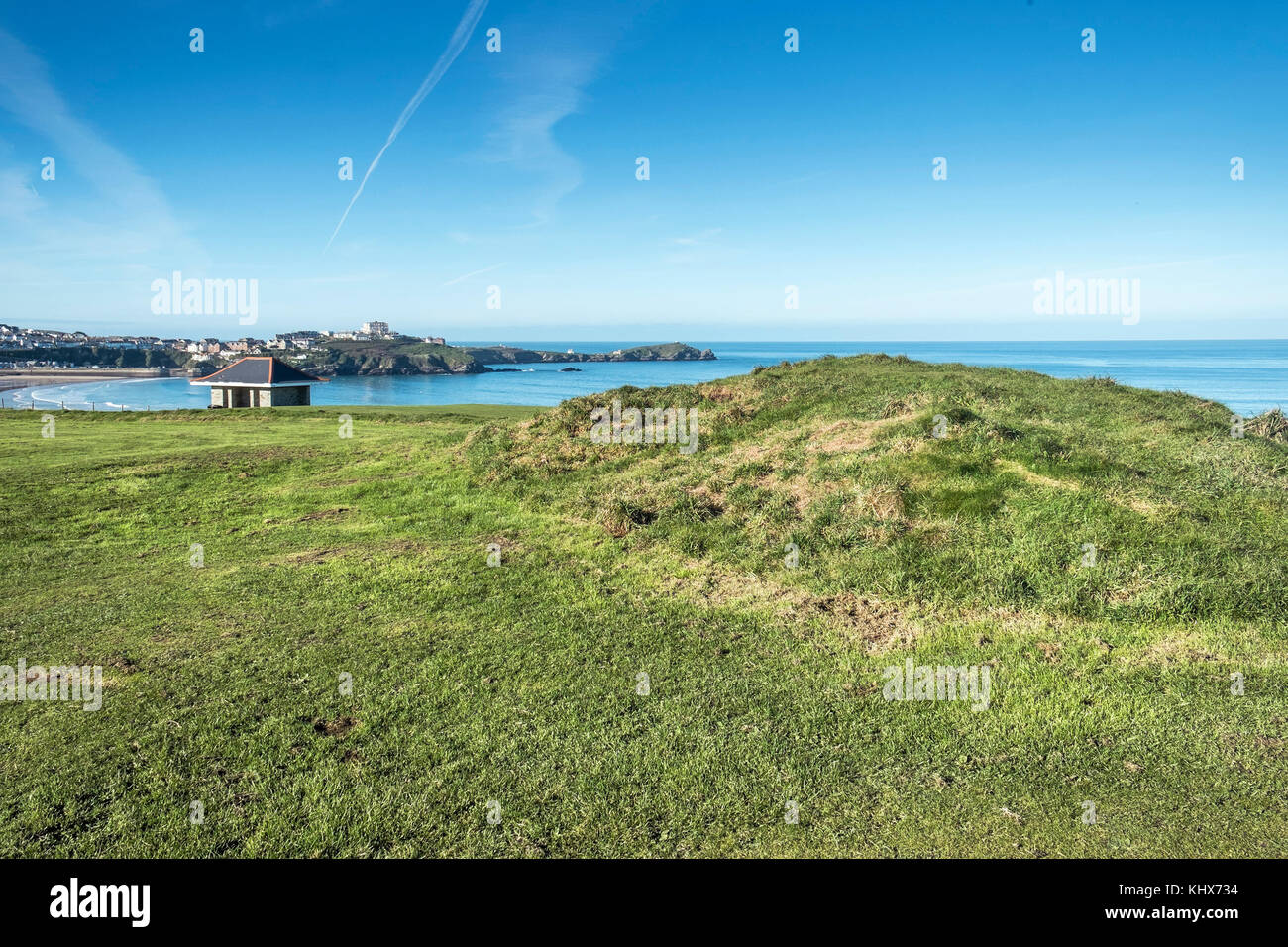 A round Bronze Age barrow tumulus at Barrowfields in Newquay Cornwall UK. Stock Photo