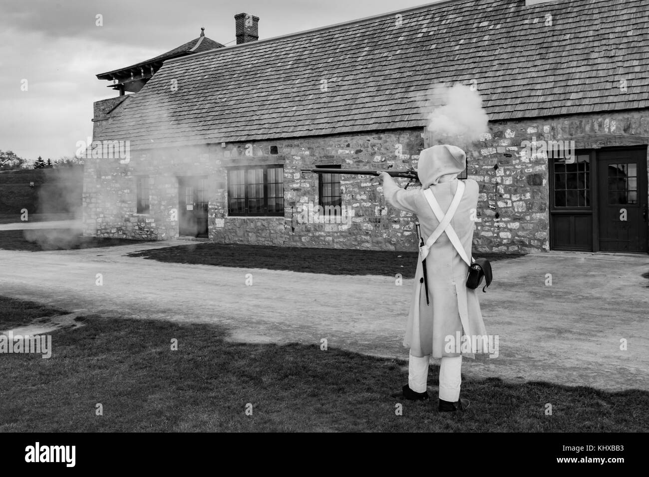 Colonial Soldier Firing a Musket Stock Photo