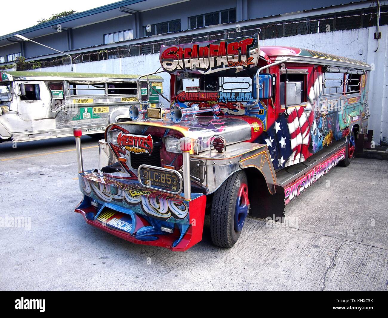 ANTIPOLO CITY, PHILIPPINES - NOVEMBER 15, 2017: Colorful passenger jeepneys with artistic designs at a jeepney parking lot. Stock Photo