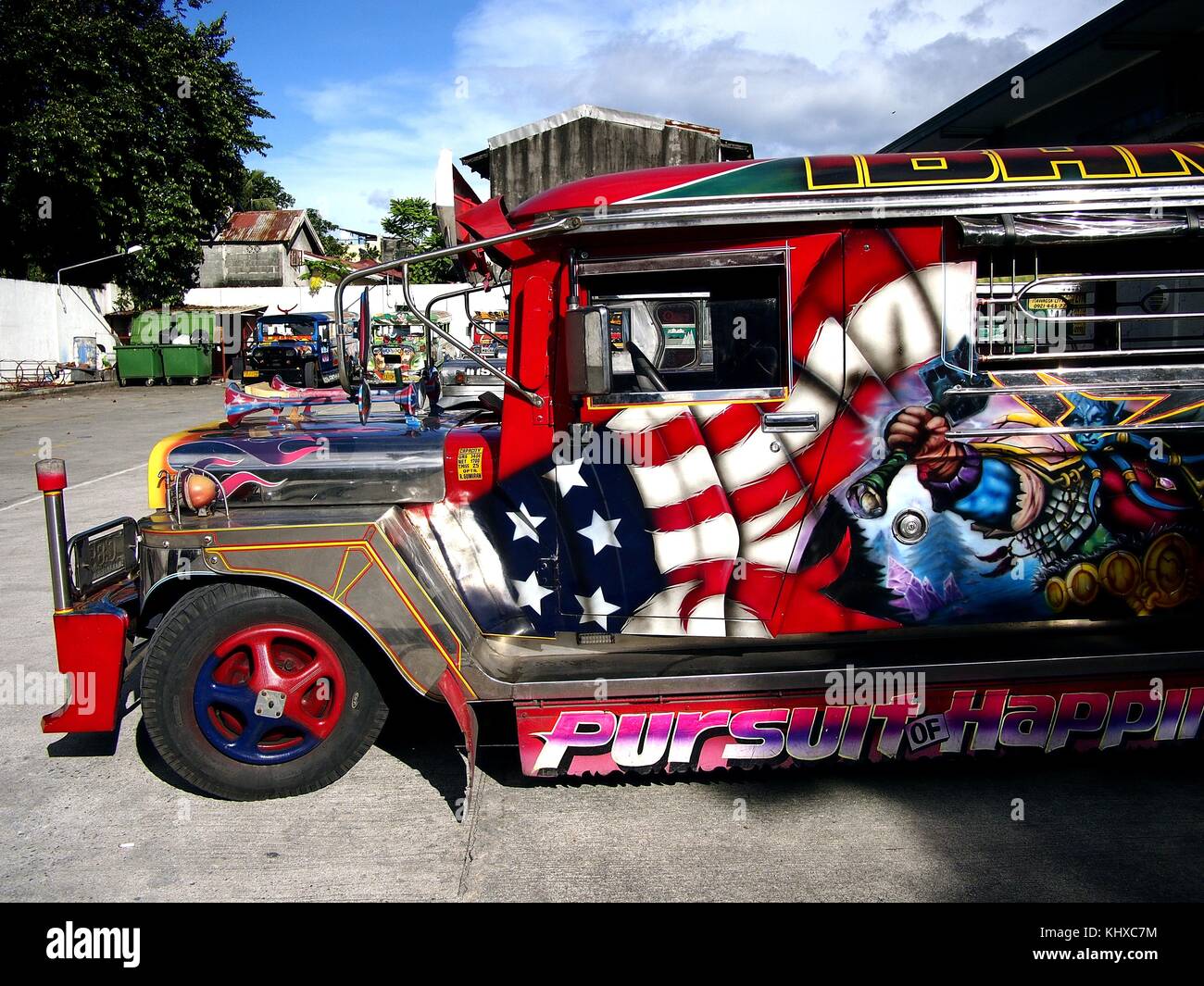 ANTIPOLO CITY, PHILIPPINES - NOVEMBER 15, 2017: Colorful passenger jeepneys with artistic designs at a jeepney parking lot. Stock Photo