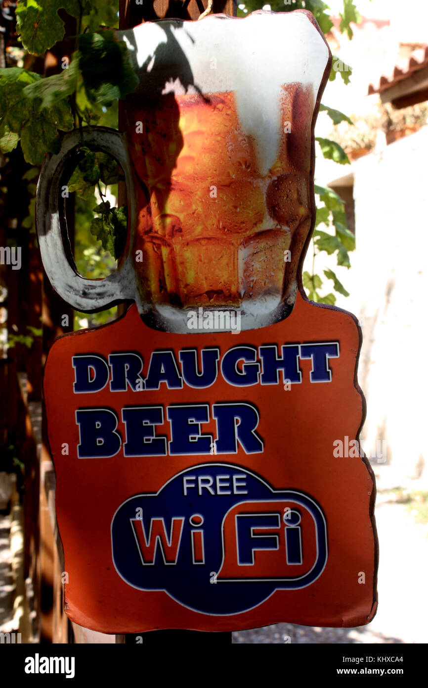 A sign at a bar in the Old Town of Rhodes Stock Photo