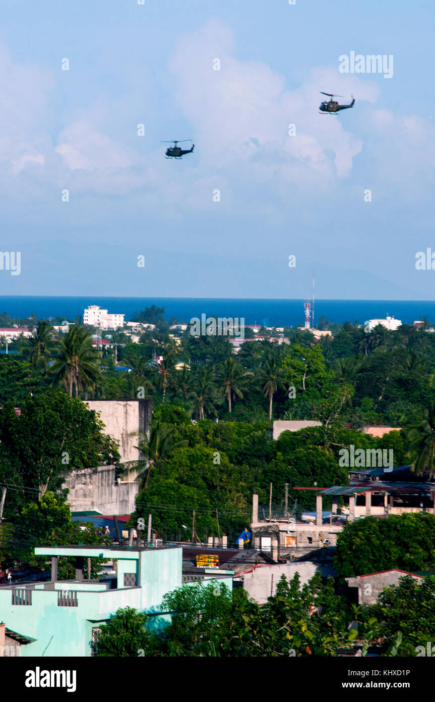 Aerial view of housing and greenery, with helicopters, Daraga, Albay, Bicol, Philippines Stock Photo