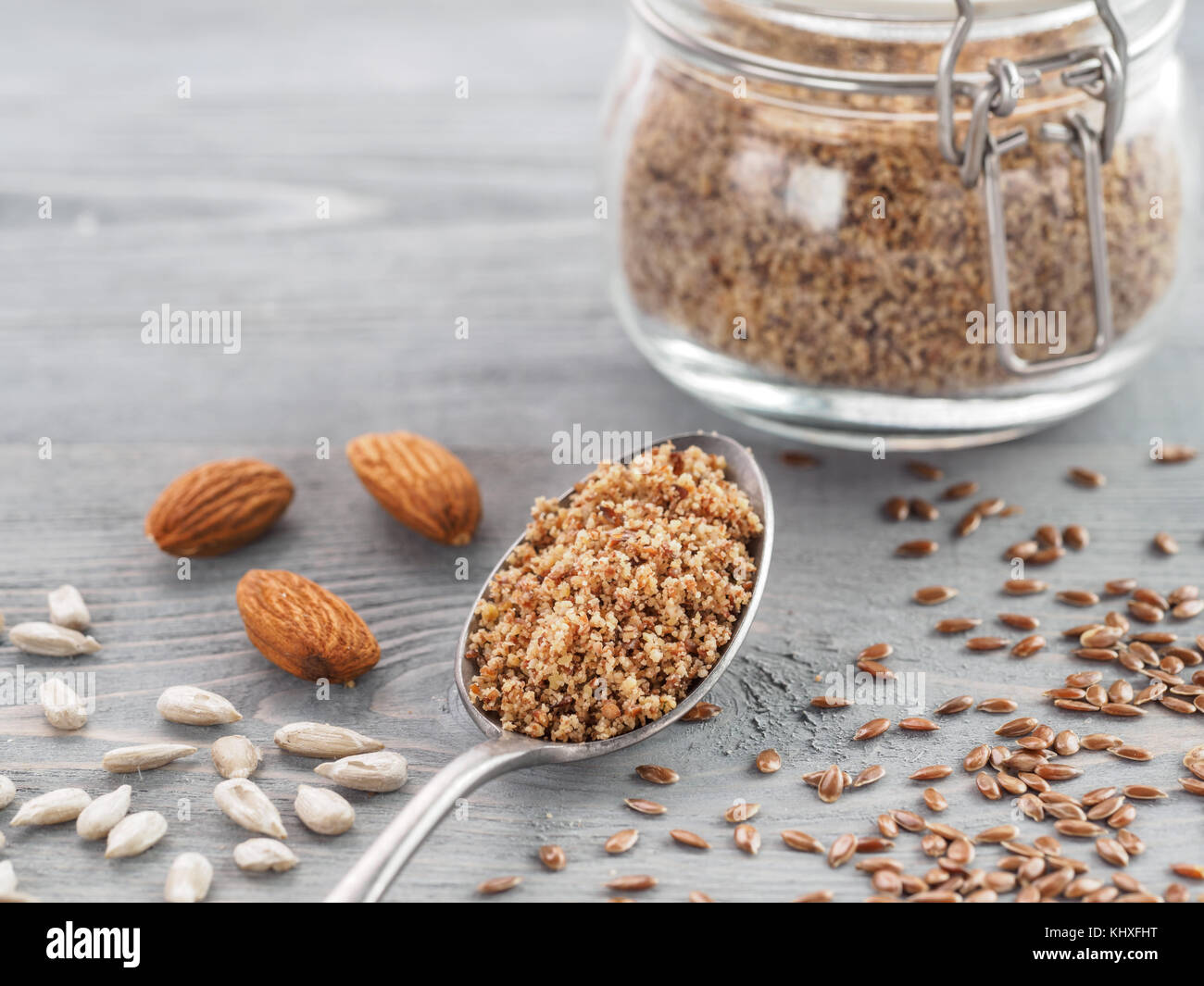 Homemade LSA mix in spoon Linseed or flax seeds, Sunflower seeds and
