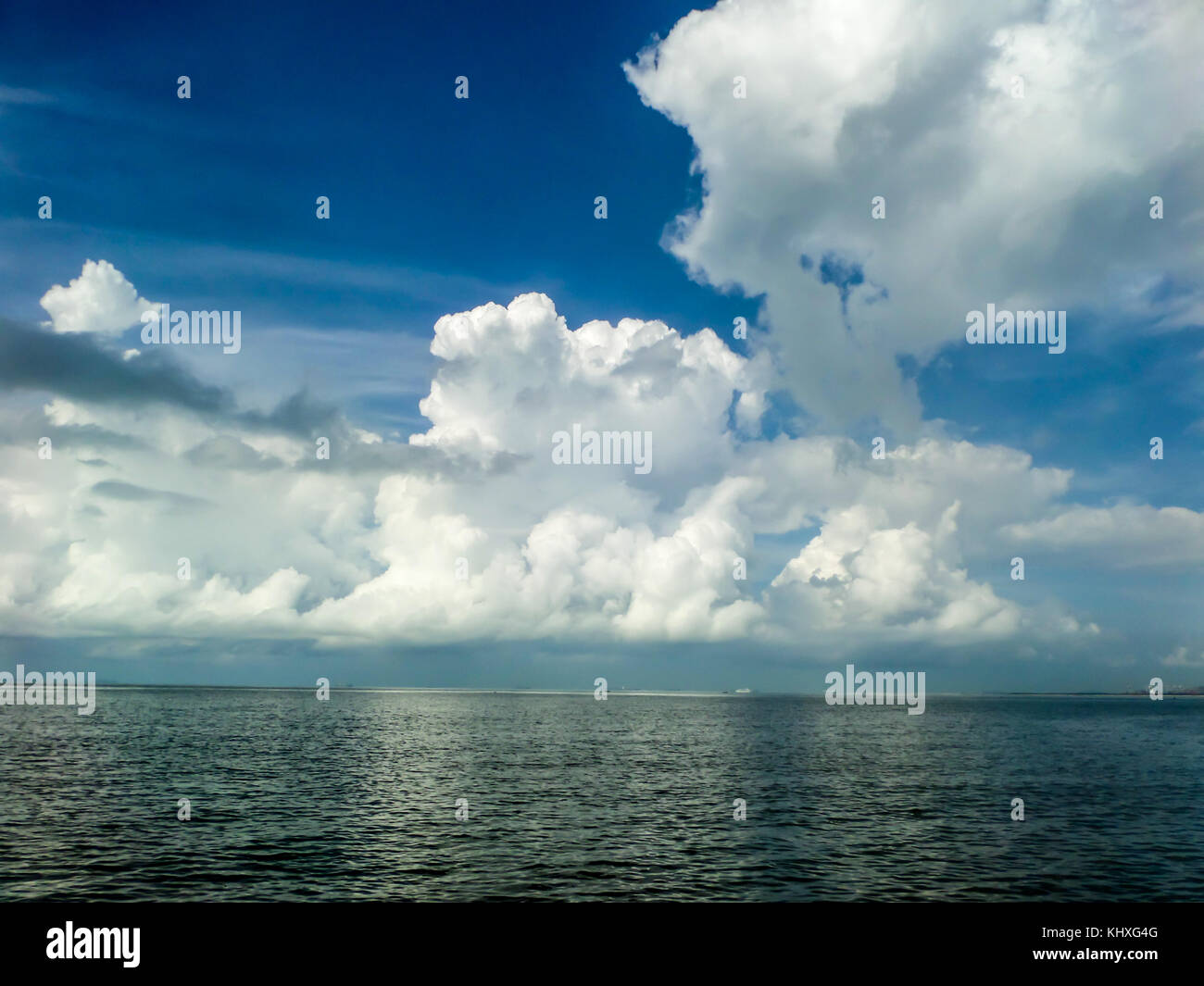 White cloud and the blue sky and sea and beach Stock Photo - Alamy