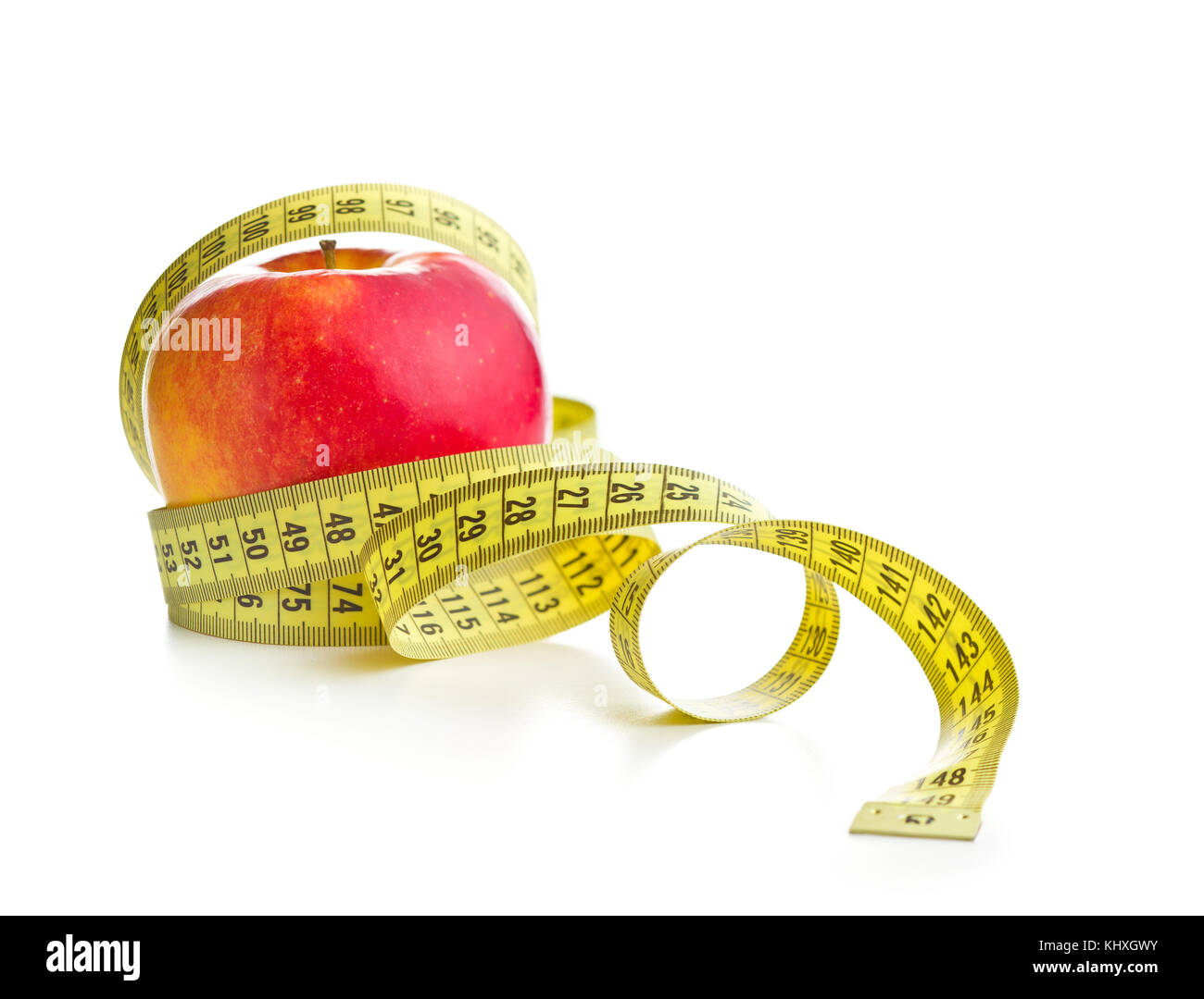 Fresh red apple and measuring tape isolated on white background. Diet concept. Stock Photo