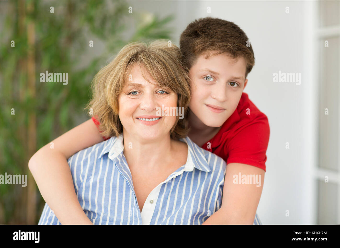 Mid-age woman with teen boy. Happy family concept Stock Photo