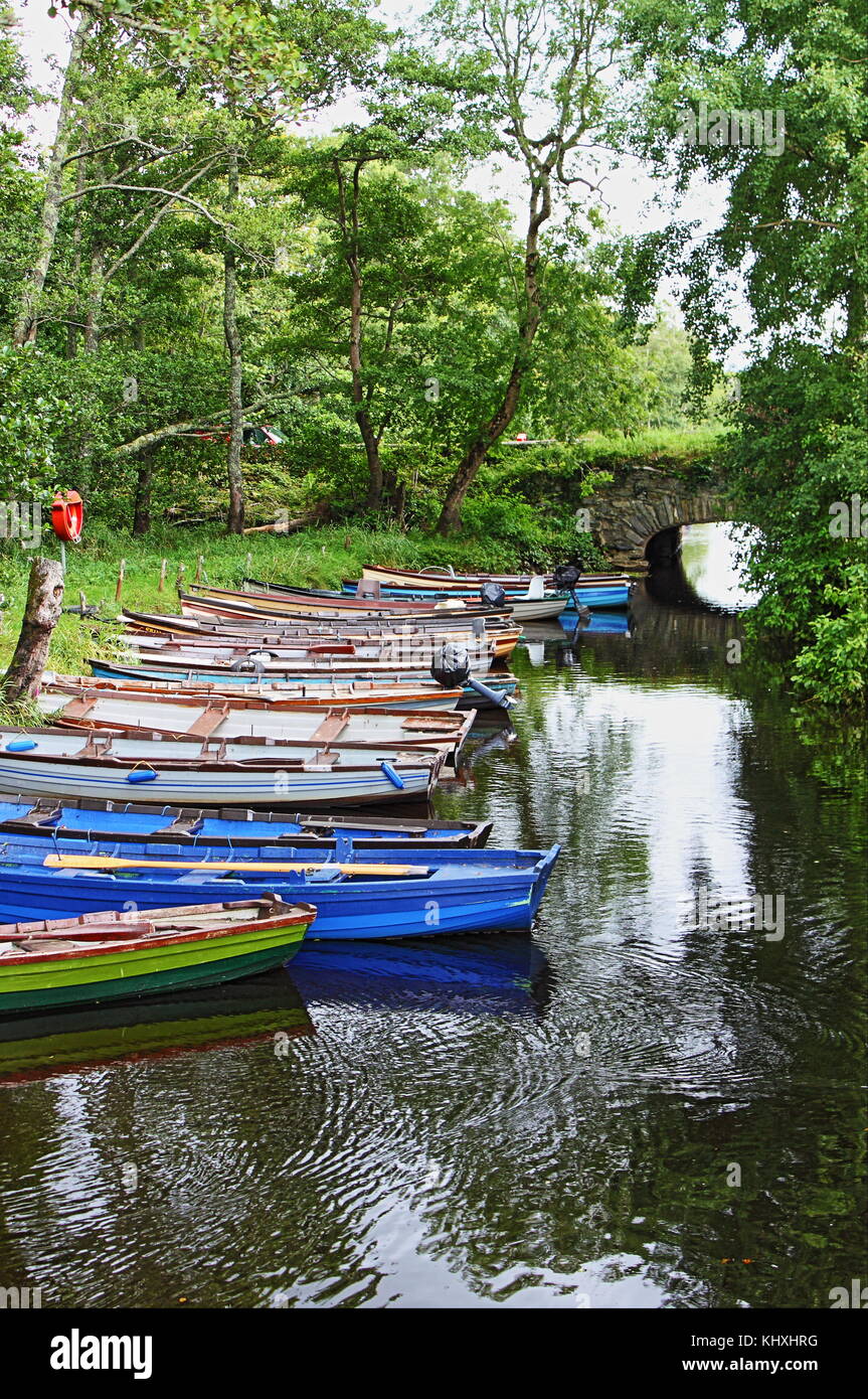 Fishing boats moored on the river Stock Photo - Alamy