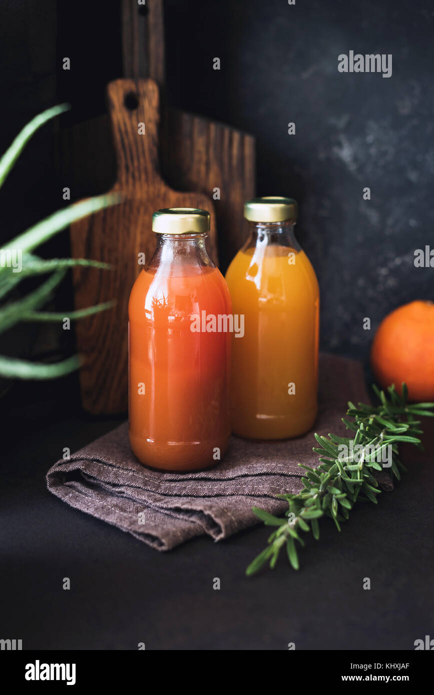 Citrus juices, detox drink, fresh raw juice in bottle. Concept of healthy lifestyle, dieting