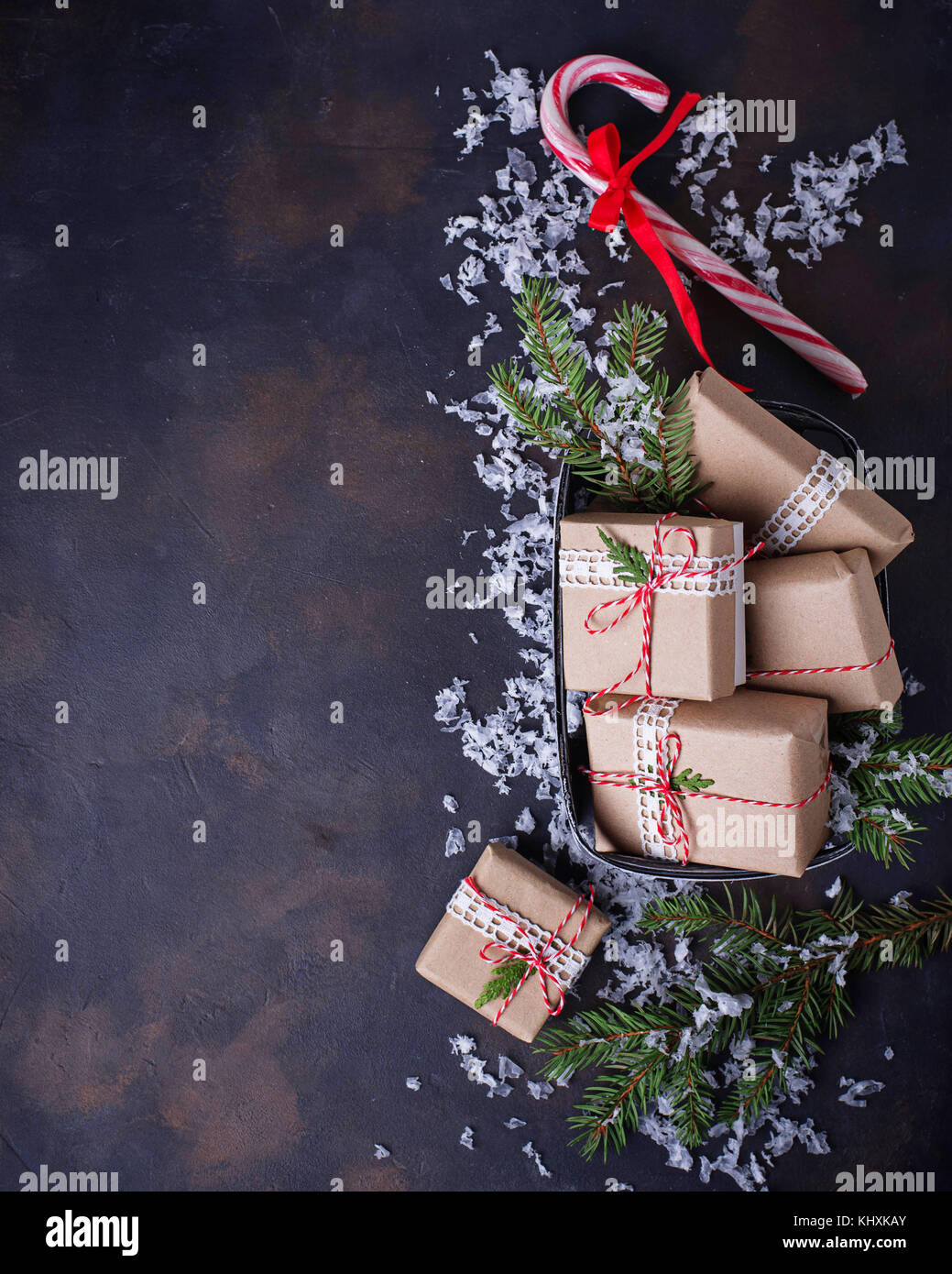 Christmas gift boxes and candy cane. Festive background. Top view Stock ...