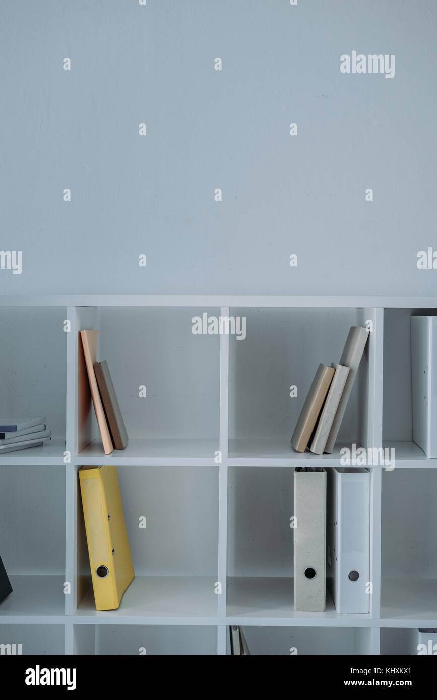 folders on shelves in office Stock Photo - Alamy