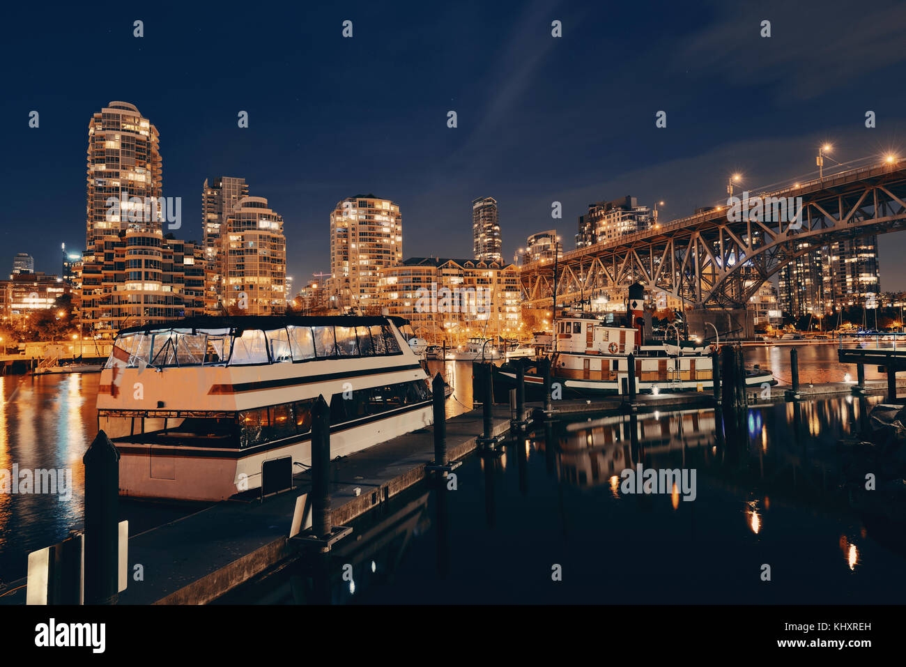 Vancouver False Creek at night with bridge and boat Stock Photo - Alamy