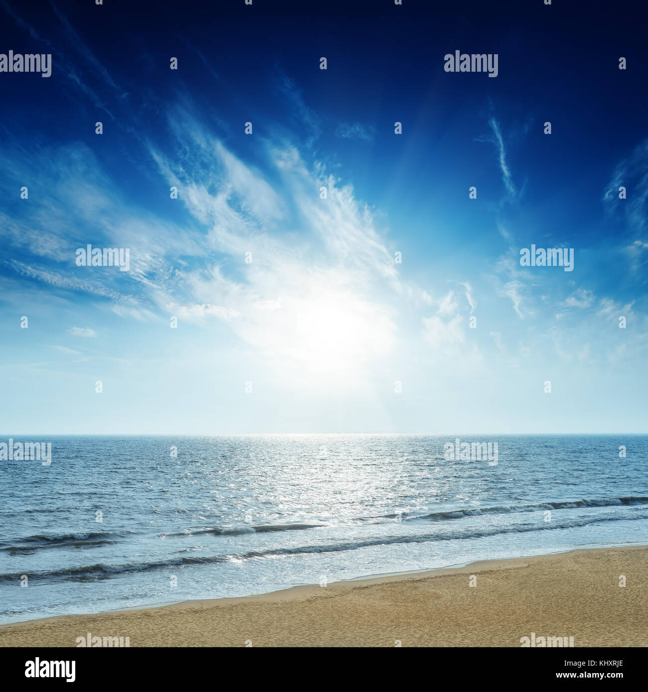 sunset in deep blue sky over sea Stock Photo - Alamy