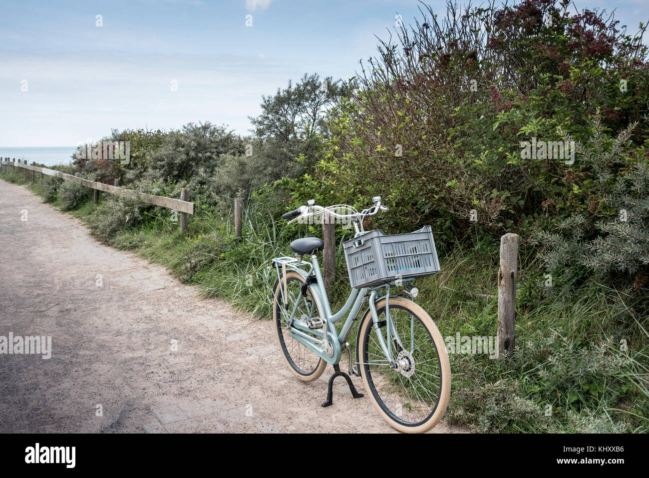 Bicycle parked on coastal path, Veere, Zeeland, Netherlands Stock Photo