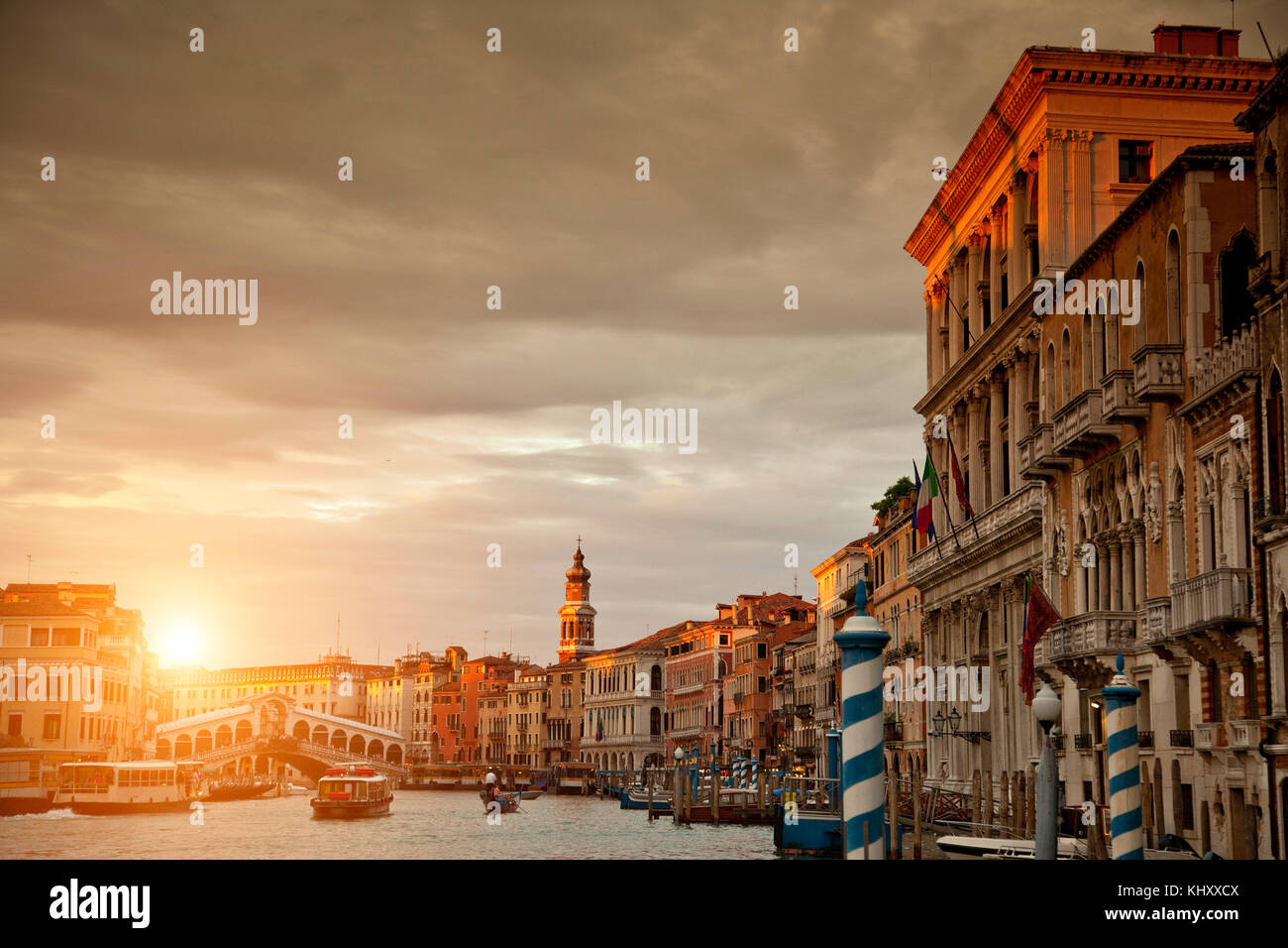 Gondola on canal at sunset, Venice, Veneto, Italy, Europe Stock Photo